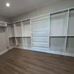 Custom Closet Accessories: Detailed view of closet accessories, including drawers, pull-out shelves, and shoe organizers.